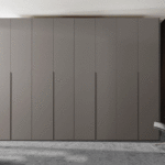 Wardrobe on measure - RAL1019 matt lacquered with integrated handles