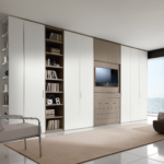 Custom-made wardrobe - wardrobe with TV and library - RAL9003, RAL1019 matt lacquered with chrome handles 49