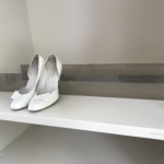 Accessories - extendable shoe shelf - exclusively for cabinets with a depth of 61 cm and modules of 89 cm wide. Ivory color lacquered matt